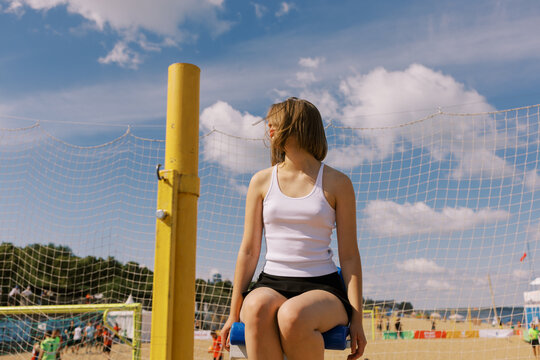 Young Woman Relaxing on referee Chair at Sunny Beach
