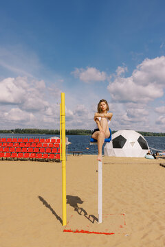 Young Woman Relaxing on referee Chair at Sunny Beach
