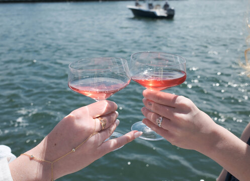 Girls Having Cocktails by Ocean