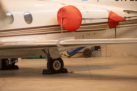 Weatherproof covers and preservation methods. Using straps and tags for terminal safeguarding. Guarding Gulfstream ports with red covers and protective materials