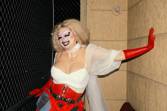 Drag performer laughing 
