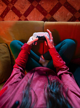 Gamer POV holding console controller