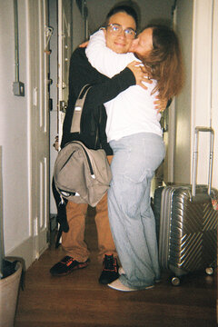 Emotional goodbye hug
