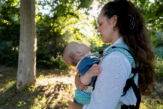 mother with her baby in nature