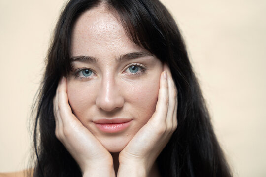 Woman Touching Face Gently