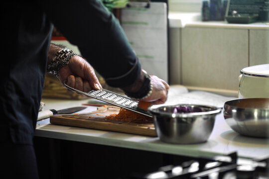 Chef Chopping Vegetables in a Modern Kitchen