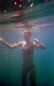 Underwater exploration in a tropical sea with a swimmer