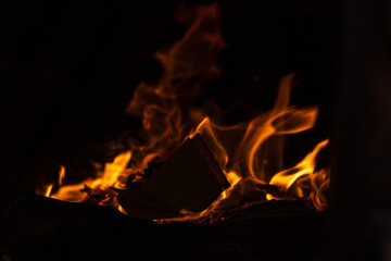 The moment the paper money burned fiercely inside the incense burner