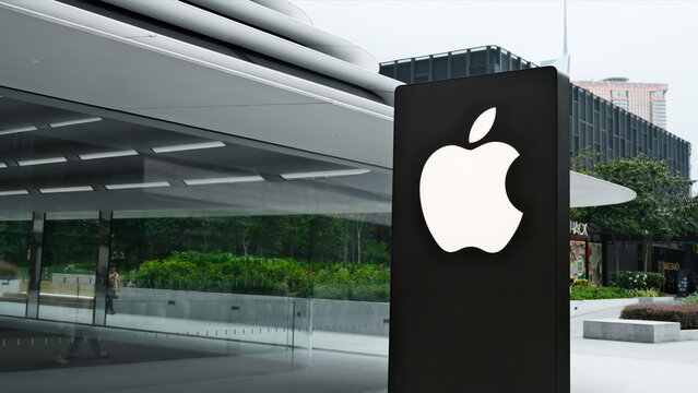 Kuala Lumpur, Malaysia on 18 August 2024: Close up of Apple store logo is shown in front of the newest Apple store at TRX Exchange shopping mall, KL. Apple signboard with a futuristic building behind