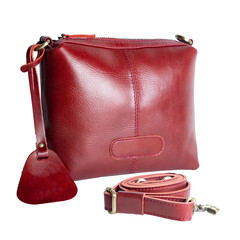 A beautiful red leather sling bag isolated on a white background, perfect for women's style. Suitable for designing leather product catalogs.
