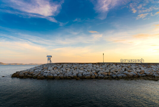sunrise seascape with tower observation old small Located , in the khao laem ya - mu ko samet National Park ,Thailand.