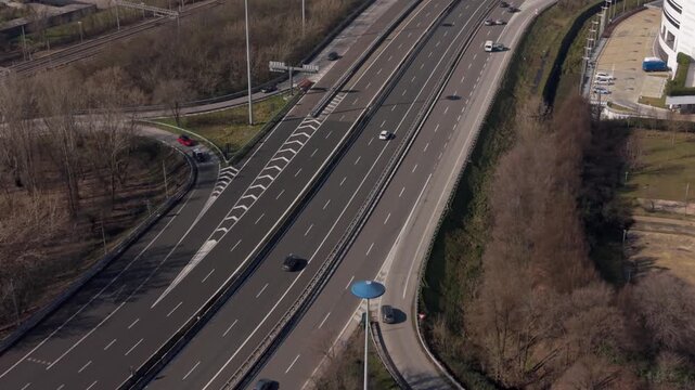 Highway Panorama: A vast highway snakes through the landscape, a testament to modern transportation and the flow of daily life. This image captures the essence of travel, infrastructure.