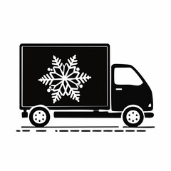 A black delivery truck with a snowflake on its side driving down the road viewed from the side