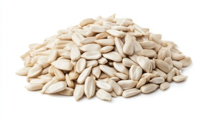 Hulled white sunflower seeds sit on a white background ready for a healthy snack option or meal addition