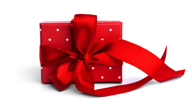 Red gift box tied with a ribbon isolated on a white background. High quality photo