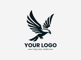 Obraz premium Black eagle logo with outstretched wings on a white background with space for custom text and tagline.