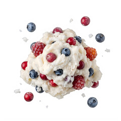 A scoop of creamy vanilla ice cream with mixed berries, blueberries, raspberries, and strawberries isolated on transparent background