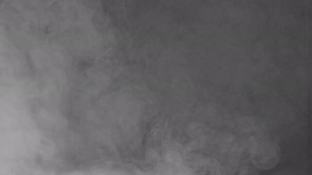 Gray Mist on Dark Backdrop. Vapor emerging from shadows, forming transient shapes before dissolving into obscurity with gradual shifts.