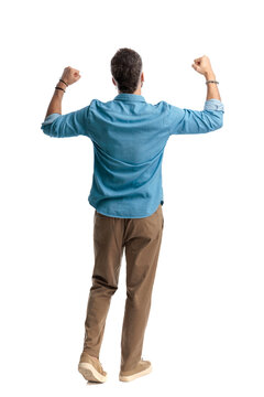 Back view of successful man celebrating victory