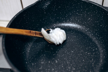 Pork lard in a non-stick cast iron pan.