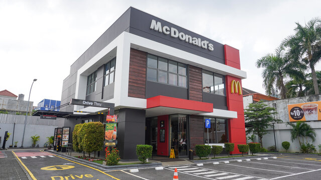 McDonald's Corporation is an American fast food chain restaurant. Franchise company sells hamburgers, chicken, chicken sandwiches, French fries, soft drinks. Mcd. 