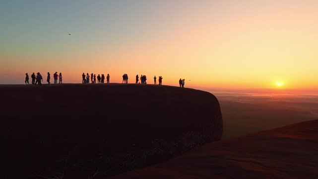 Bueng Kan, Thailand. 02 December 2025; Three Whale Rock Iconic Viewpoint of Northeastern Thailand. Epic sunrise at a famous Thai viewpoint, capturing tiny human figures on a colossal rock ledge