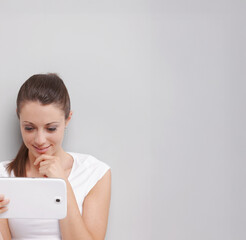 Smiling Woman Using Tablet With Copy Space