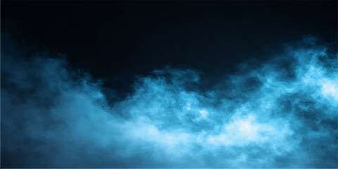 A bright blue sky filled with white clouds meets an abstract swirl of blue smoke against a dark background to create a nature-inspired summer cloudscape full of light and air © MdShakibAhamed