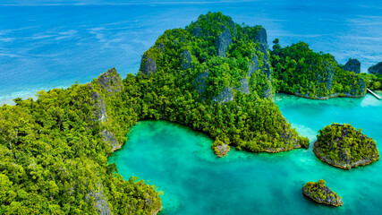Aerial view of landscape scene with Raja Ampat Islands, Indonesian archipelago, West Papua, Indonesia