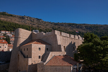 Revelin Fortress and Croatian flag with Mount Srd - Dubrovnik, Croatia