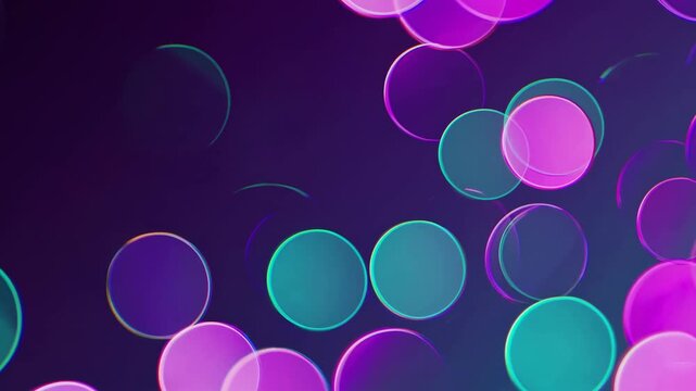 Colorful bokeh circles in shades of blue, green, and pink gradually shift and blend against a dark background, creating a mesmerizing visual effect in a continuous flow