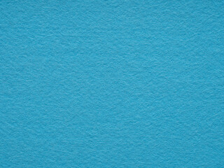 Sky blue felt texture closeup. Handicraft concept, crafts, DIY, do it yourself. Top view, flat lay, layout, place for text. For shops with goods for creativity, to illustrate patchwork master classes.