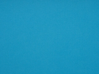 Soothing sky blue canvas with a subtle texture, evoking calmness and a breezy lightness