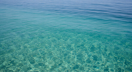 Fototapeta premium A serene view of the clear blue ocean waters with gentle waves