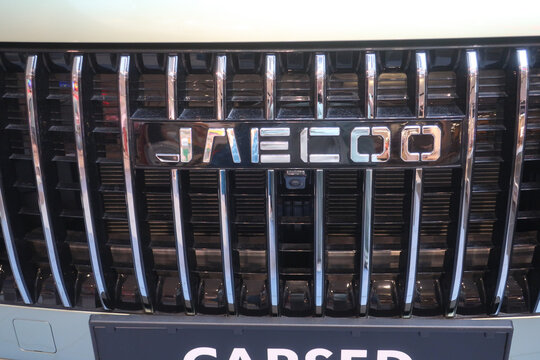 Jaecoo 7 car front with logo, emblem, closeup view. WARSAW, POLAND - AUGUST 2, 2025