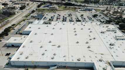 HVAC and cable spread industrial flat rooftop, mechanical units, bundles, vents, retail parcels near Heritage Dr, US‑75 sit west of Clearview Park and adjacent neighborhood streets, Plano, Texas