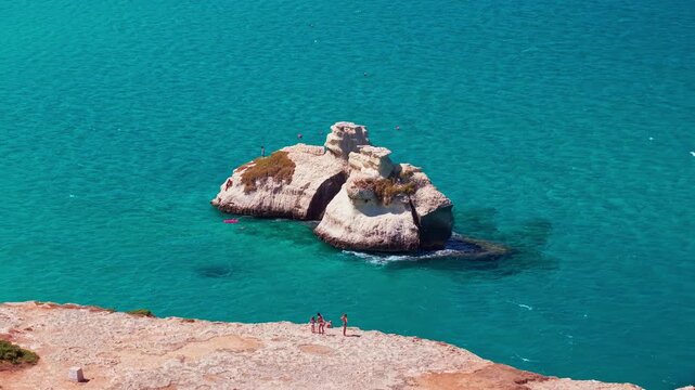 Aerial view of Le Due Sorelle sea stacks in Torre dell Orso, Puglia, Italy