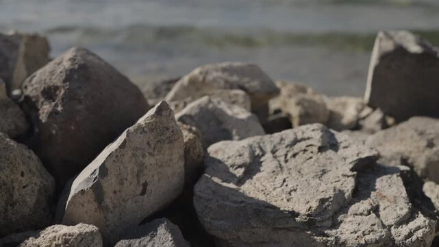Slow motion handheld footage of lake Sevan in Armenia windy autumn season
