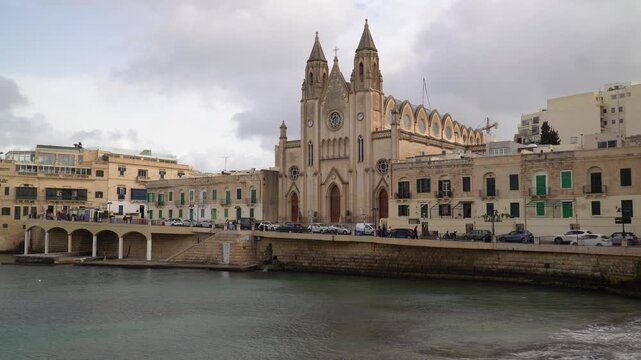 The Carmelite Church also known as the Balluta Parish Church, a neo-gothic Roman Catholic church located in Balluta Bay in the town of St Julian's, Malta.