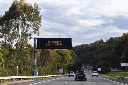 Drinking? Don&rsquo;t drive warning notice text on overhead digital sign above road in NSW Australia 