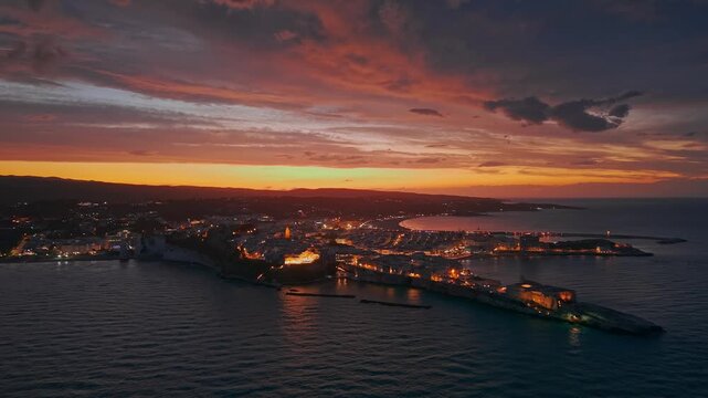 Aerial Night View of Vieste Medieval Town in Puglia Italy