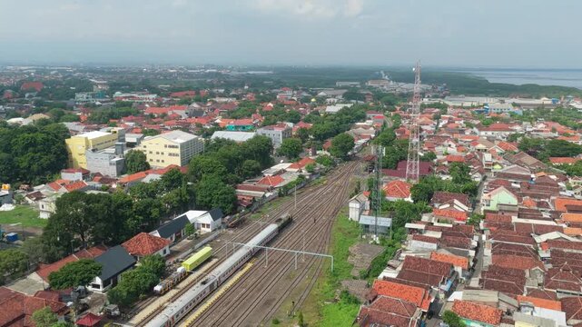 Aerial view of train arriving at probolinggo station in java