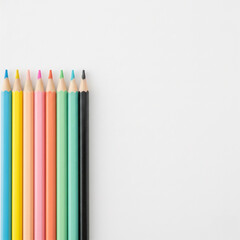 Fototapeta premium Colorful Pencils on White Background, Minimal School Supplies Flat Lay with Copy Space