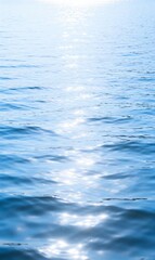 Sunlit Blue Ocean Waves with Sparkling Light