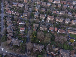 Fototapeta premium Aerial shot of Birkenhead’s suburban layout under clear, bright sunshine.
