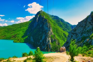 Bovilla, Albania - April 27, 2024. Attractive spring view of Bovilla Lake, Tirana city location. Majestic morning landscape of Albania, Europe. Beauty of nature concept background. Hike, breath relax