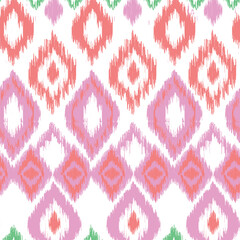 Colorful tribal ikat seamless pattern with pink, green, and coral diamond shapes for textile print for fabric, seamless pattern