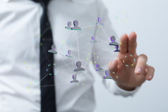 Concept of social network, communication, business and global connections. Hand of businessman with digital graphic ove