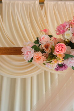 wedding decor, photo zone, floral arch, pastel flowers, beige curtains, drapes, tulle, crystal candelabra, artificial candles, ghost chair, romantic setting, marriage ceremony, engagement party, event
