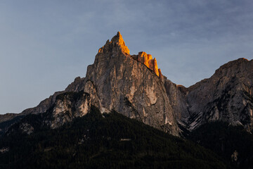 Majestic Alpenglow on the Sciliar (Schlern) mountain peak at sunset, Dolomites, South Tyrol, Italy